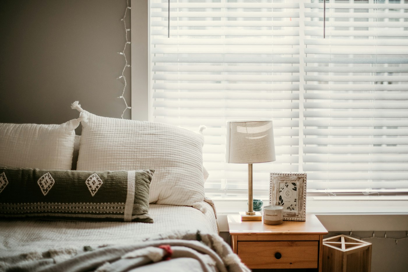 Calm, softly lit bedroom prepared for restful sleep